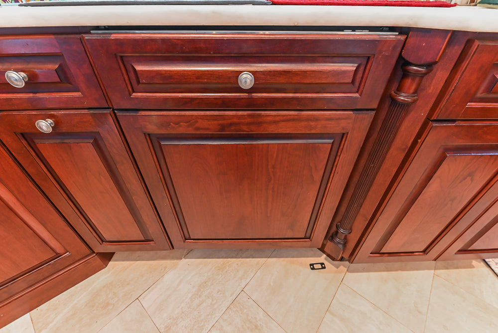 Custom Traditional Dark Wooden Kitchen with Marble Countertops and Wolf Appliances