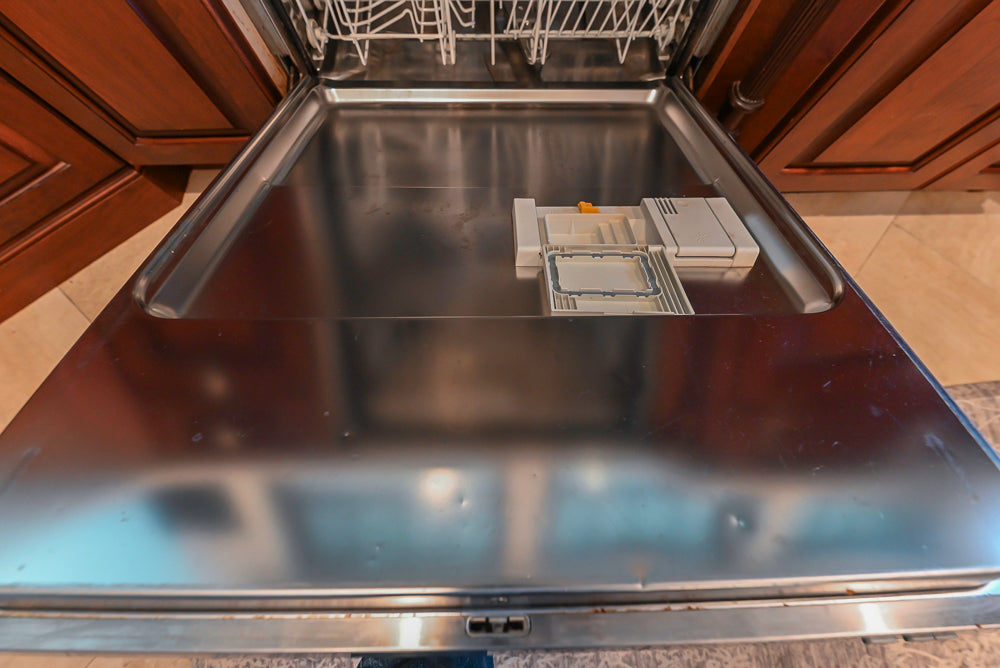 Custom Traditional Dark Wooden Kitchen with Marble Countertops and Wolf Appliances