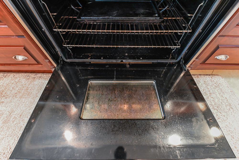 Custom Traditional Dark Wooden Kitchen with Marble Countertops and Wolf Appliances