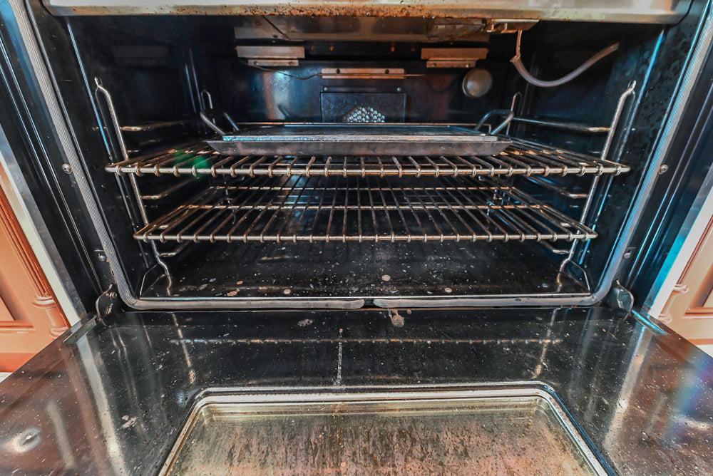 Custom Traditional Dark Wooden Kitchen with Marble Countertops and Wolf Appliances