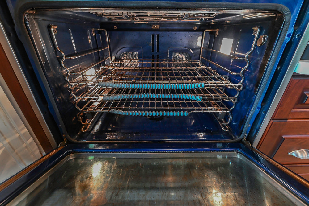 Custom Traditional Dark Wooden Kitchen with Marble Countertops and Wolf Appliances