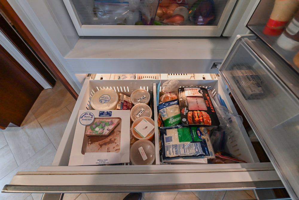 Custom Traditional Dark Wooden Kitchen with Marble Countertops and Wolf Appliances