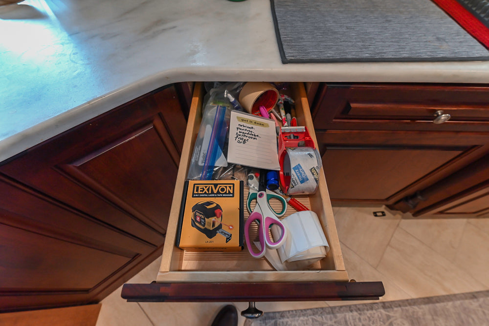 Custom Traditional Dark Wooden Kitchen with Marble Countertops and Wolf Appliances