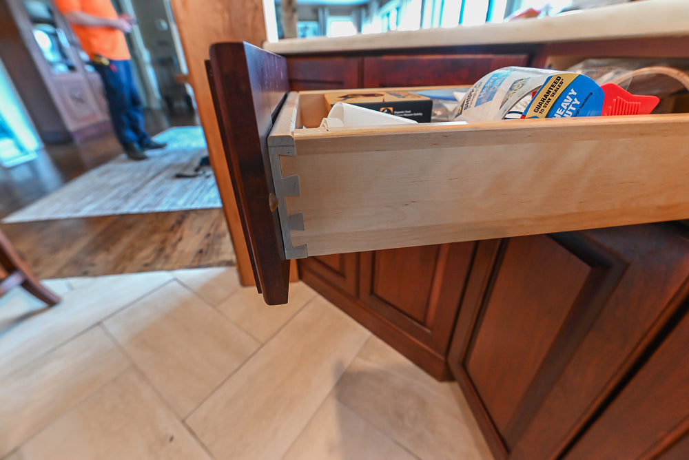 Custom Traditional Dark Wooden Kitchen with Marble Countertops and Wolf Appliances