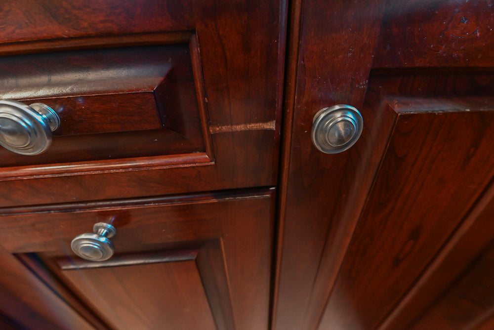 Custom Traditional Dark Wooden Kitchen with Marble Countertops and Wolf Appliances