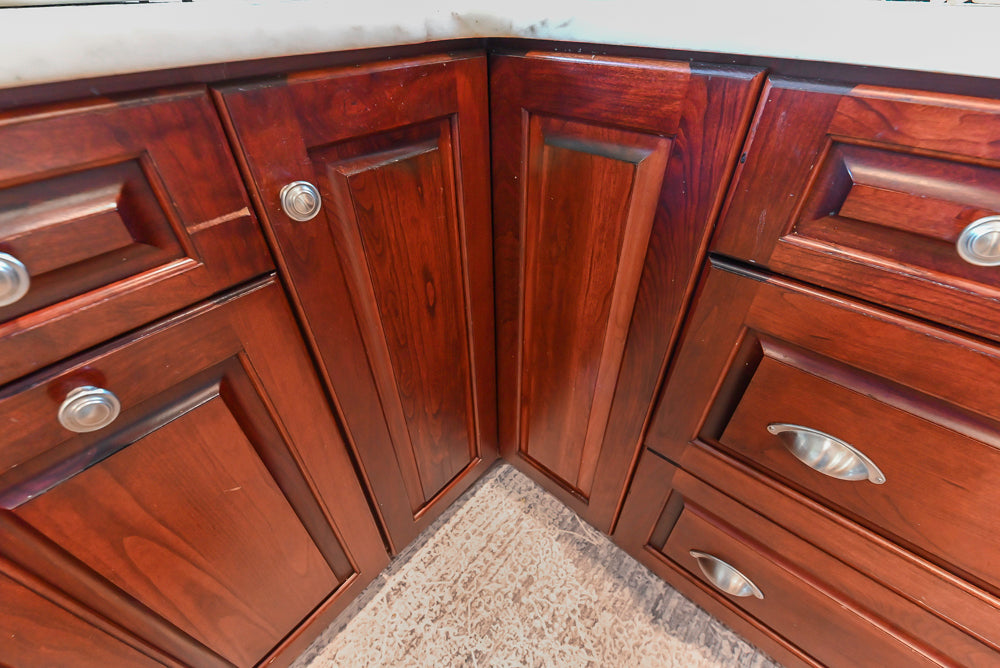 Custom Traditional Dark Wooden Kitchen with Marble Countertops and Wolf Appliances