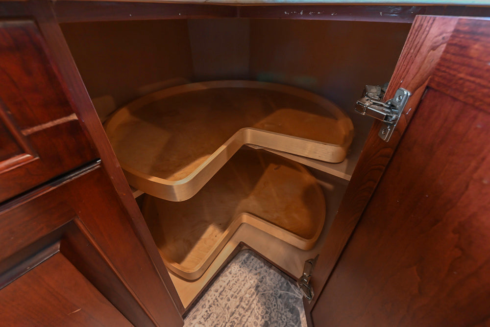 Custom Traditional Dark Wooden Kitchen with Marble Countertops and Wolf Appliances