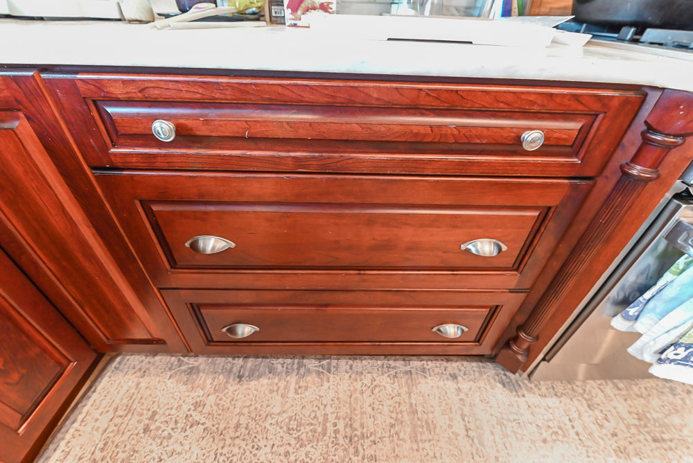 Custom Traditional Dark Wooden Kitchen with Marble Countertops and Wolf Appliances