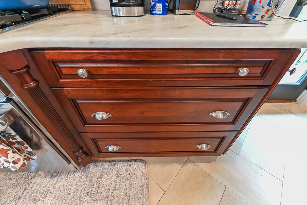 Custom Traditional Dark Wooden Kitchen with Marble Countertops and Wolf Appliances