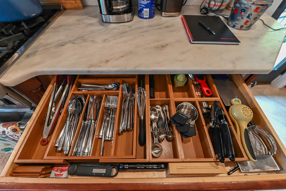 Custom Traditional Dark Wooden Kitchen with Marble Countertops and Wolf Appliances
