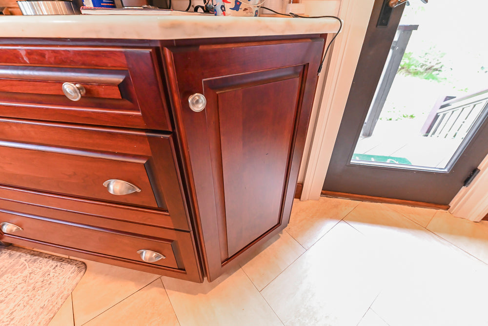 Custom Traditional Dark Wooden Kitchen with Marble Countertops and Wolf Appliances