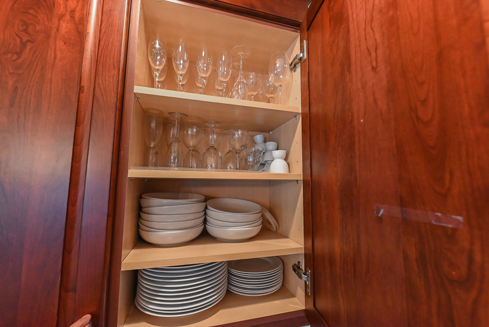 Custom Traditional Dark Wooden Kitchen with Marble Countertops and Wolf Appliances