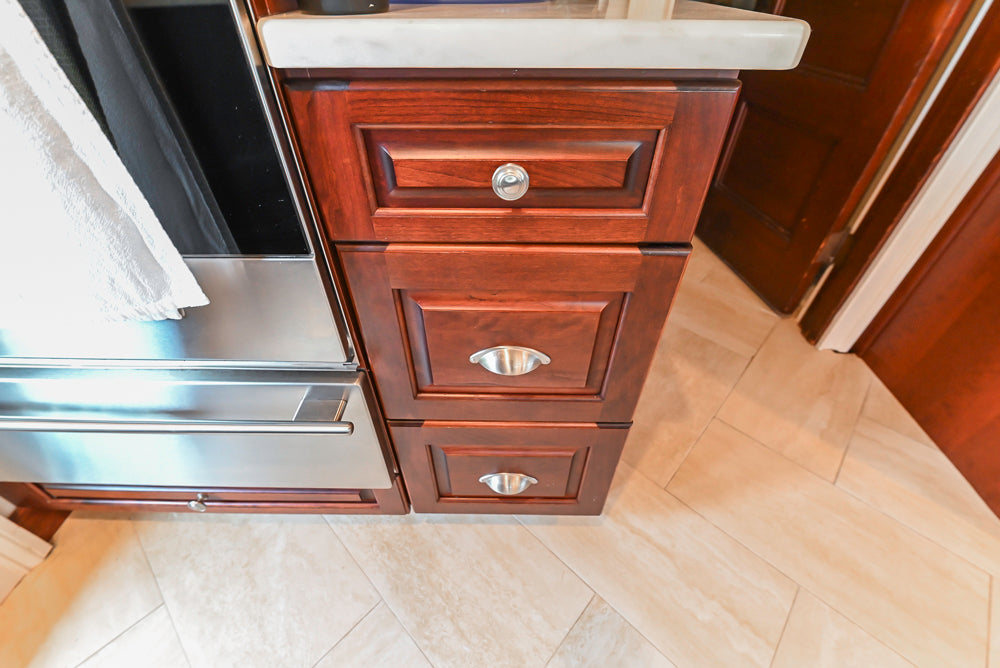 Custom Traditional Dark Wooden Kitchen with Marble Countertops and Wolf Appliances