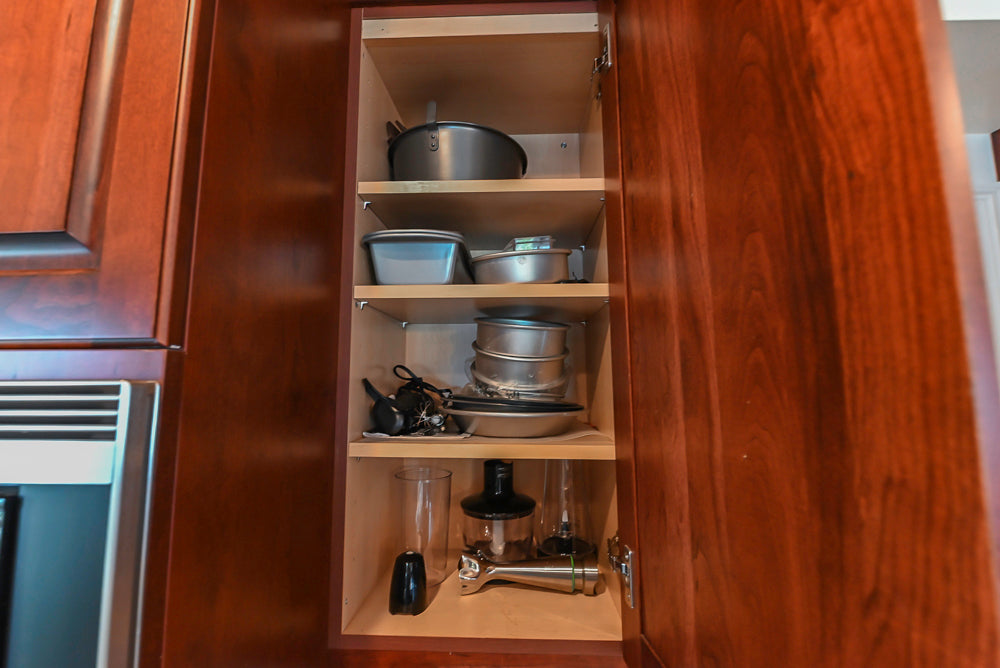Custom Traditional Dark Wooden Kitchen with Marble Countertops and Wolf Appliances