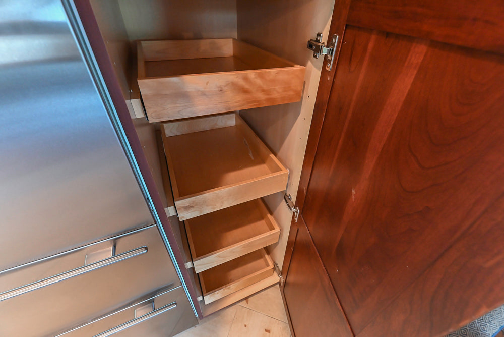 Custom Traditional Dark Wooden Kitchen with Marble Countertops and Wolf Appliances