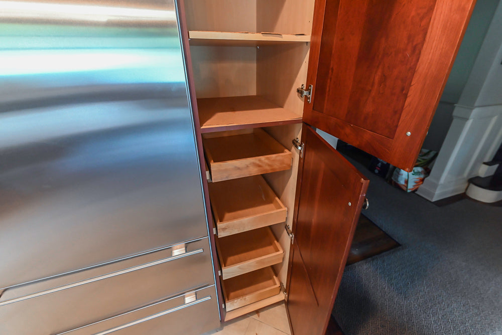 Custom Traditional Dark Wooden Kitchen with Marble Countertops and Wolf Appliances