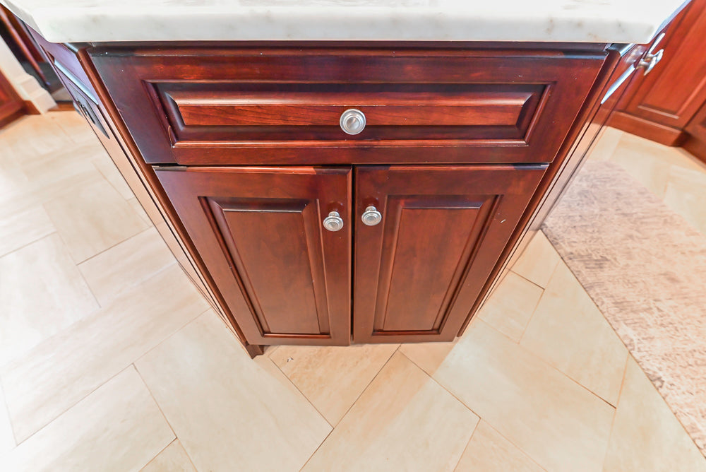 Custom Traditional Dark Wooden Kitchen with Marble Countertops and Wolf Appliances