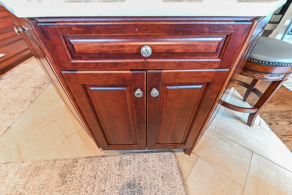 Custom Traditional Dark Wooden Kitchen with Marble Countertops and Wolf Appliances