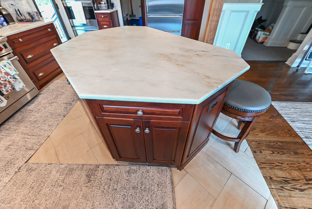 Custom Traditional Dark Wooden Kitchen with Marble Countertops and Wolf Appliances