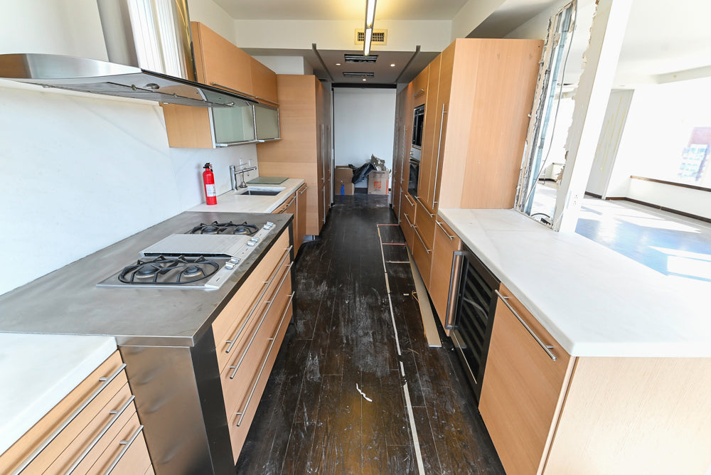 Poggenpohl Modern Light Wood Veneer Kitchen with White Marble Countertops and Appliances