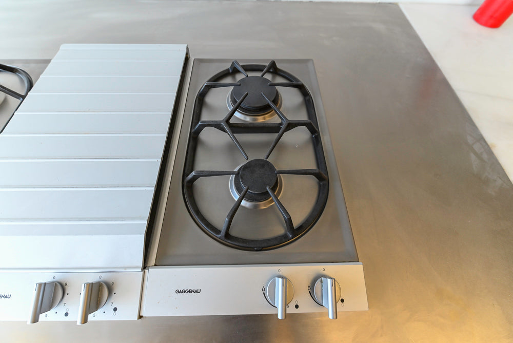 Poggenpohl Modern Light Wood Veneer Kitchen with White Marble Countertops and Appliances