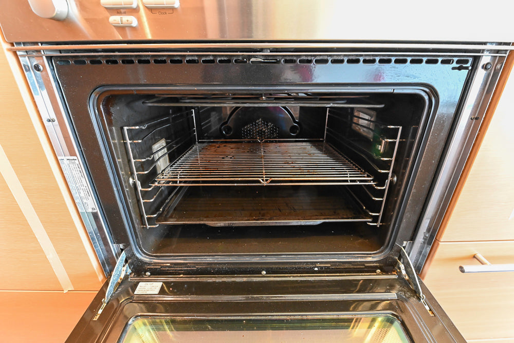 Poggenpohl Modern Light Wood Veneer Kitchen with White Marble Countertops and Appliances