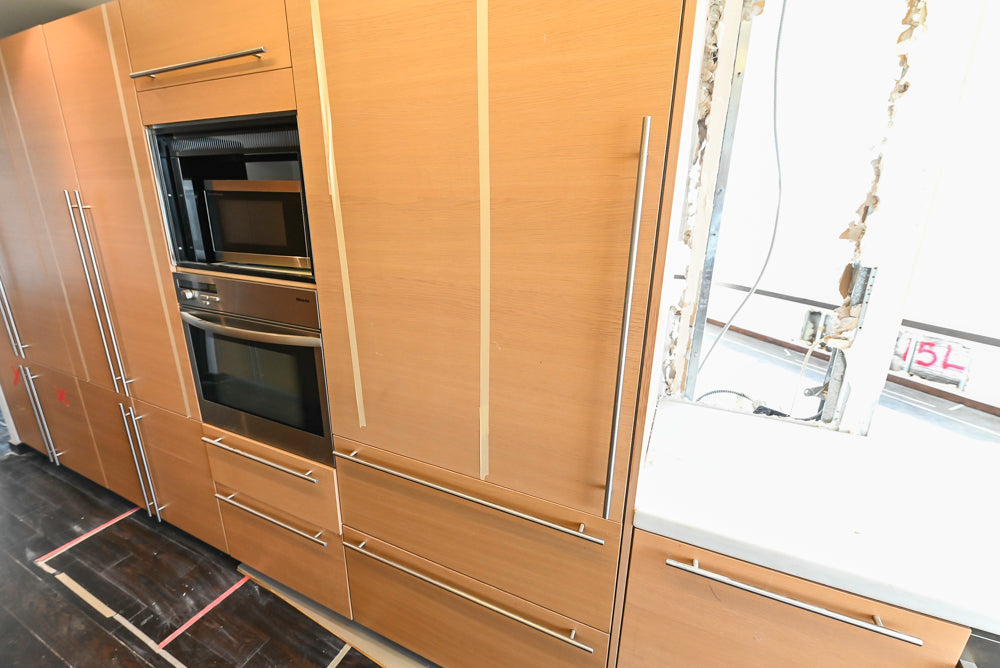 Poggenpohl Modern Light Wood Veneer Kitchen with White Marble Countertops and Appliances