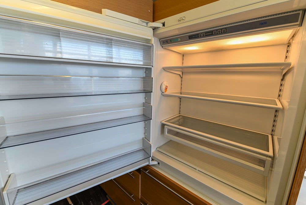 Poggenpohl Modern Light Wood Veneer Kitchen with White Marble Countertops and Appliances