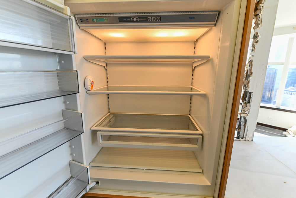 Poggenpohl Modern Light Wood Veneer Kitchen with White Marble Countertops and Appliances