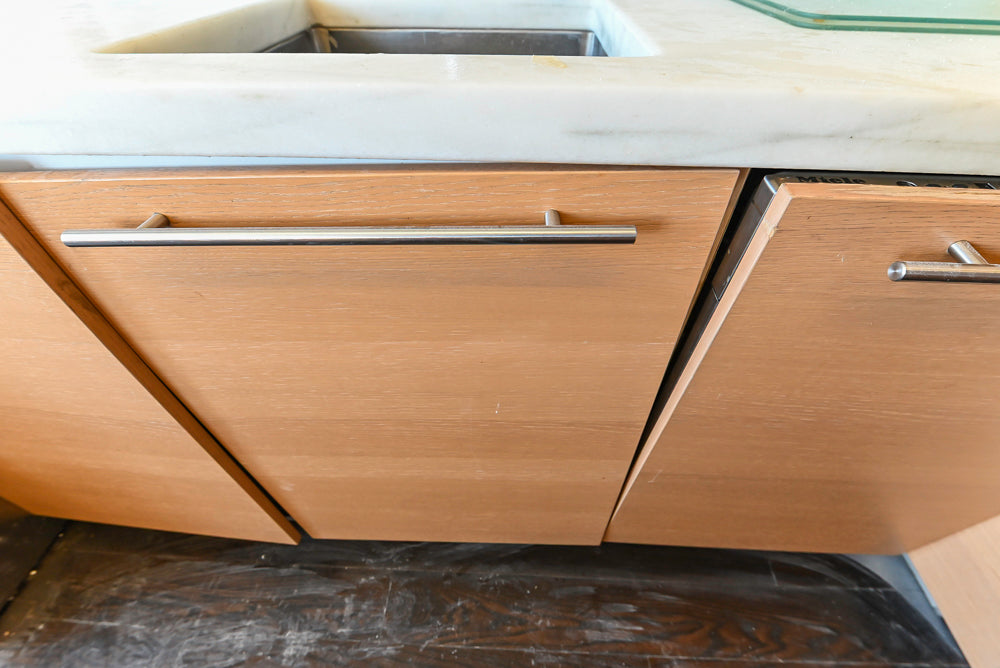 Poggenpohl Modern Light Wood Veneer Kitchen with White Marble Countertops and Appliances