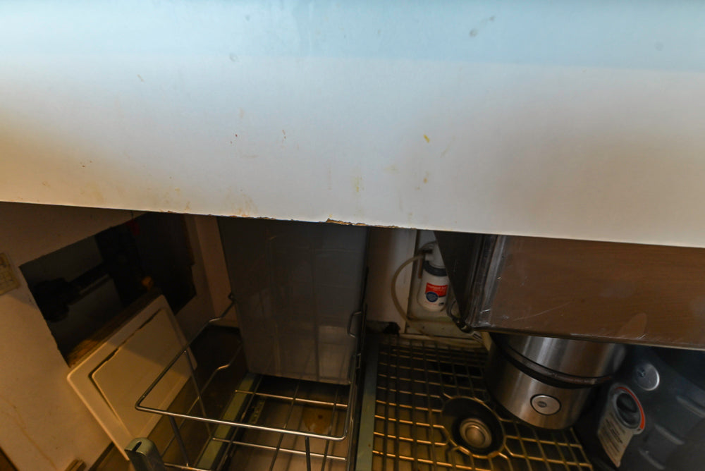 Poggenpohl Modern Light Wood Veneer Kitchen with White Marble Countertops and Appliances