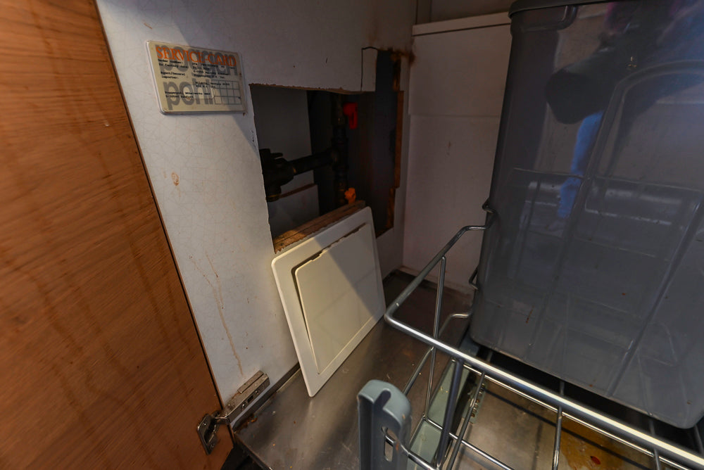 Poggenpohl Modern Light Wood Veneer Kitchen with White Marble Countertops and Appliances