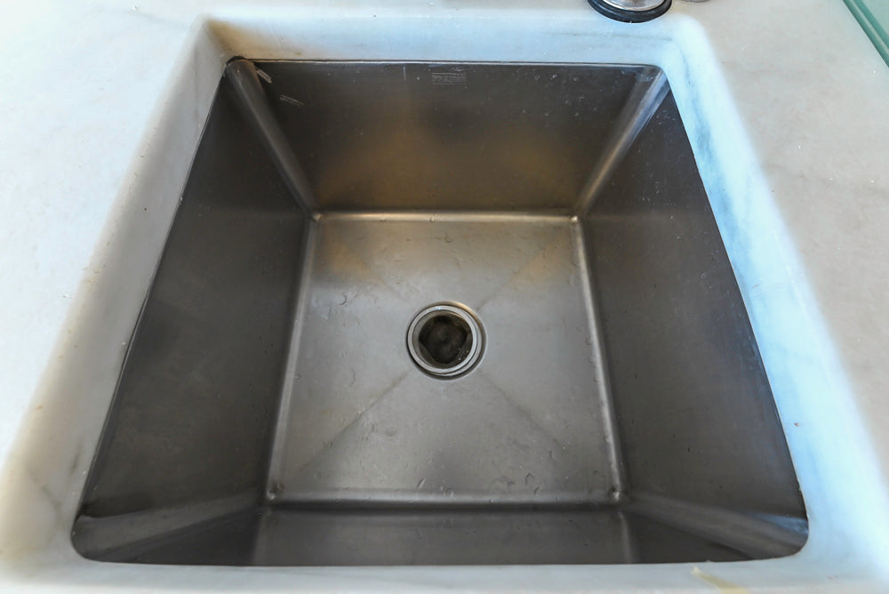 Poggenpohl Modern Light Wood Veneer Kitchen with White Marble Countertops and Appliances