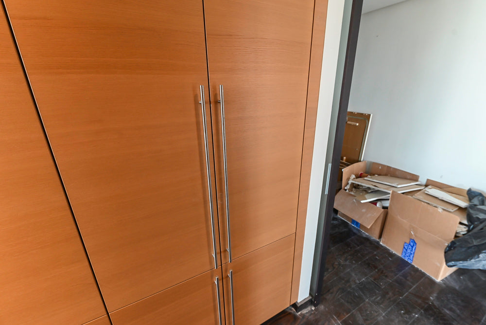 Poggenpohl Modern Light Wood Veneer Kitchen with White Marble Countertops and Appliances