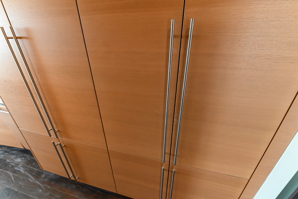 Poggenpohl Modern Light Wood Veneer Kitchen with White Marble Countertops and Appliances