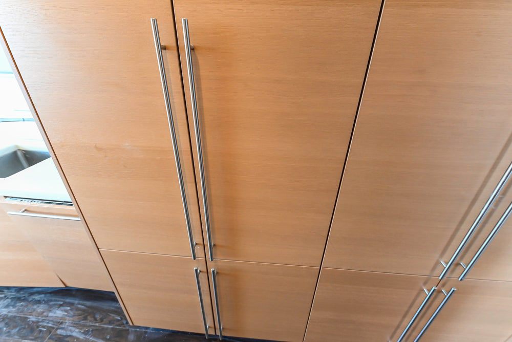 Poggenpohl Modern Light Wood Veneer Kitchen with White Marble Countertops and Appliances