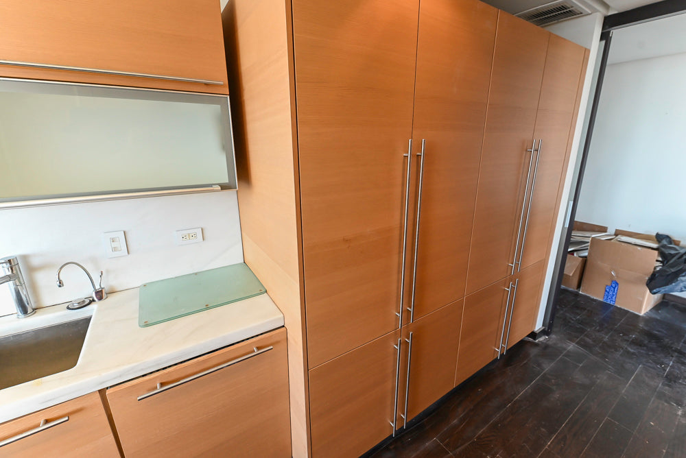 Poggenpohl Modern Light Wood Veneer Kitchen with White Marble Countertops and Appliances