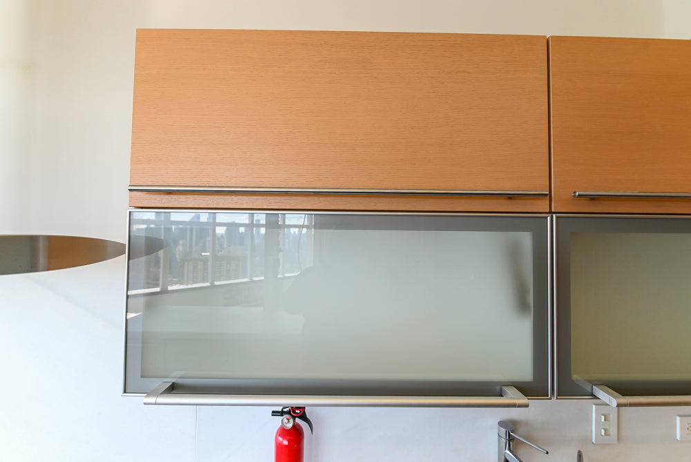 Poggenpohl Modern Light Wood Veneer Kitchen with White Marble Countertops and Appliances