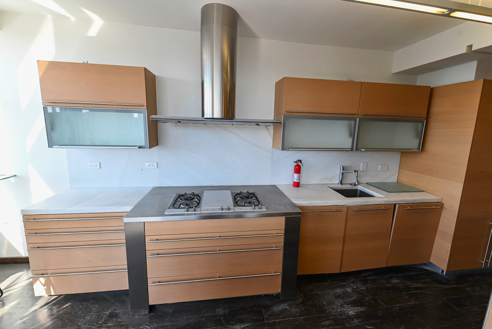 Poggenpohl Modern Light Wood Veneer Kitchen with White Marble Countertops and Appliances