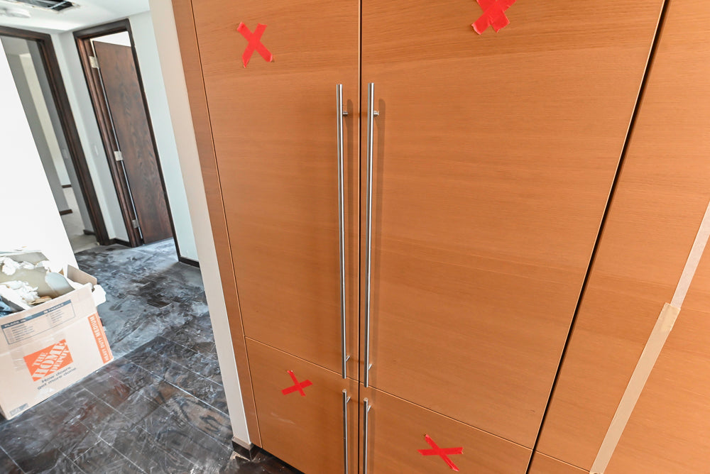 Poggenpohl Modern Light Wood Veneer Kitchen with White Marble Countertops and Appliances