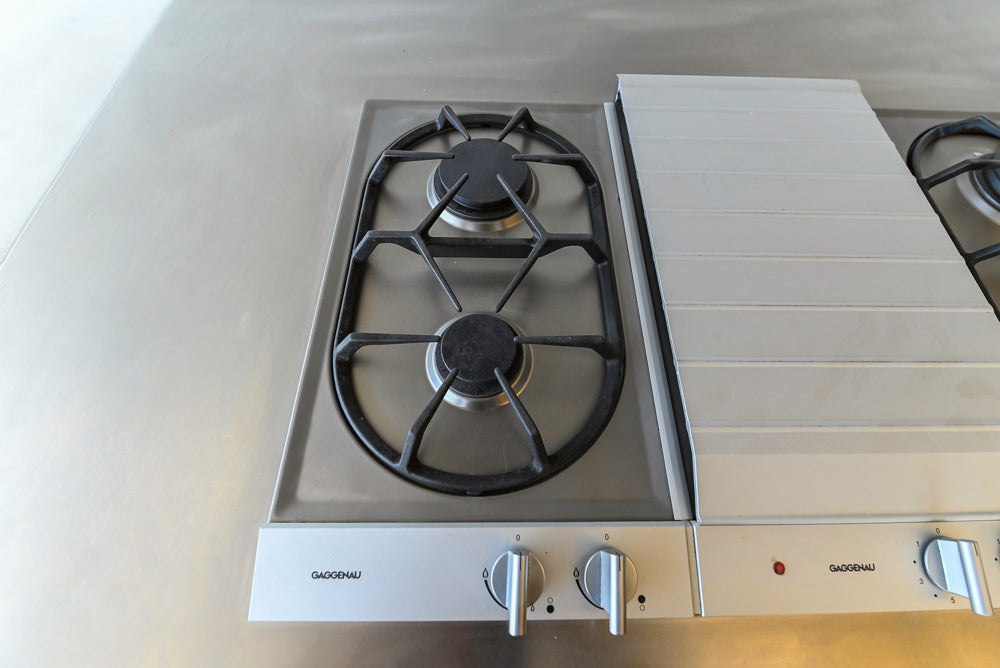 Poggenpohl Modern Light Wood Veneer Kitchen with White Marble Countertops and Appliances