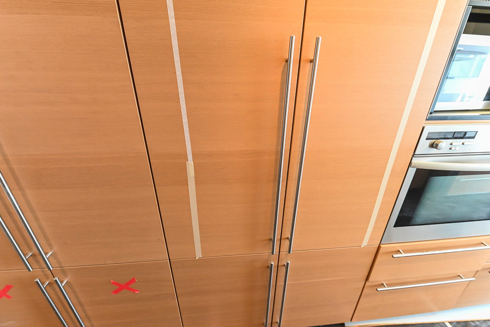 Poggenpohl Modern Light Wood Veneer Kitchen with White Marble Countertops and Appliances