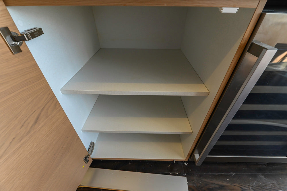 Poggenpohl Modern Light Wood Veneer Kitchen with White Marble Countertops and Appliances