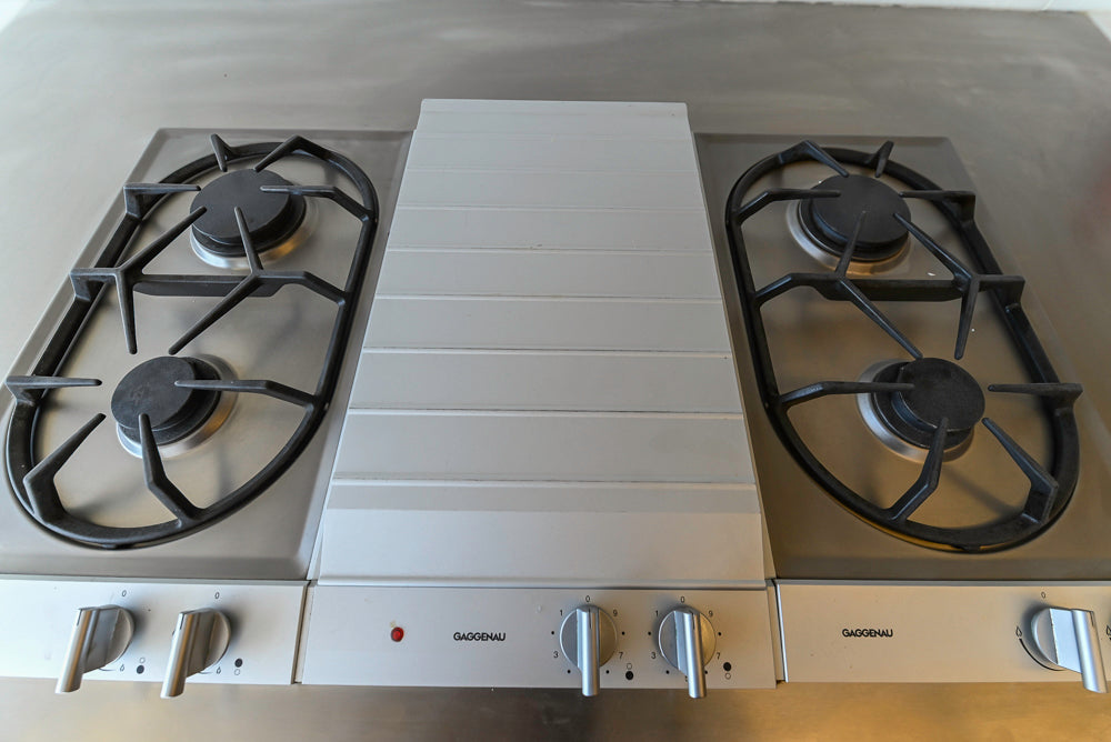 Poggenpohl Modern Light Wood Veneer Kitchen with White Marble Countertops and Appliances