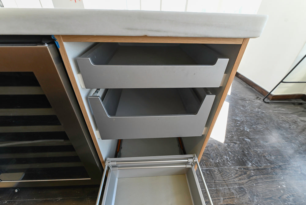 Poggenpohl Modern Light Wood Veneer Kitchen with White Marble Countertops and Appliances