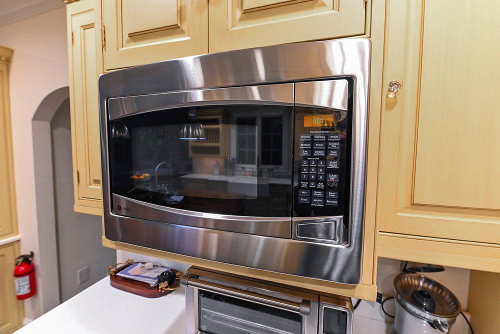 Custom Traditional "Clive-esque" Kitchen with Marble Countertops, Wood Top Island and Appliances