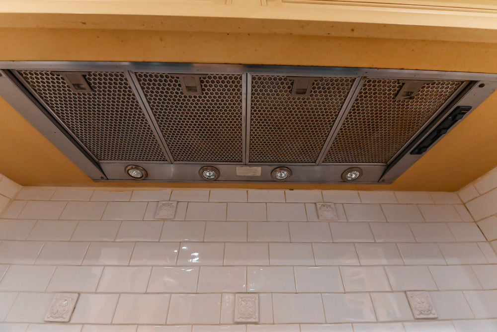 Custom Traditional "Clive-esque" Kitchen with Marble Countertops, Wood Top Island and Appliances