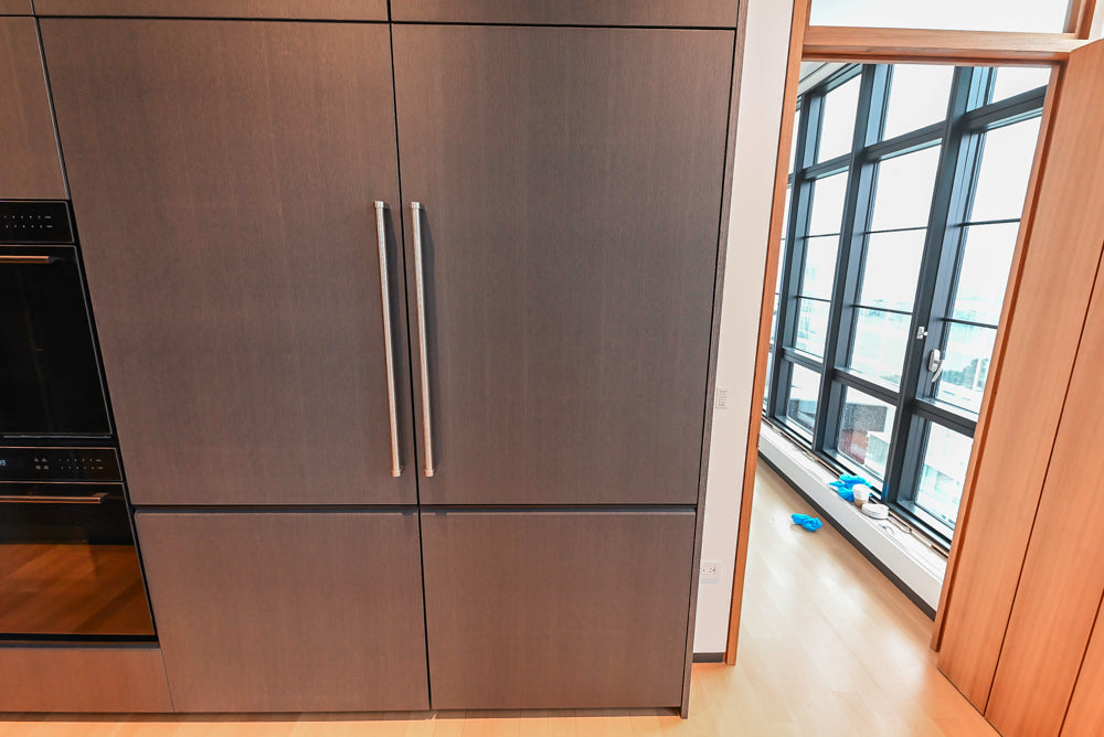 Custom Modern Wood Veneer Kitchen with White Marble Countertops and Wolf & Miele Appliances
