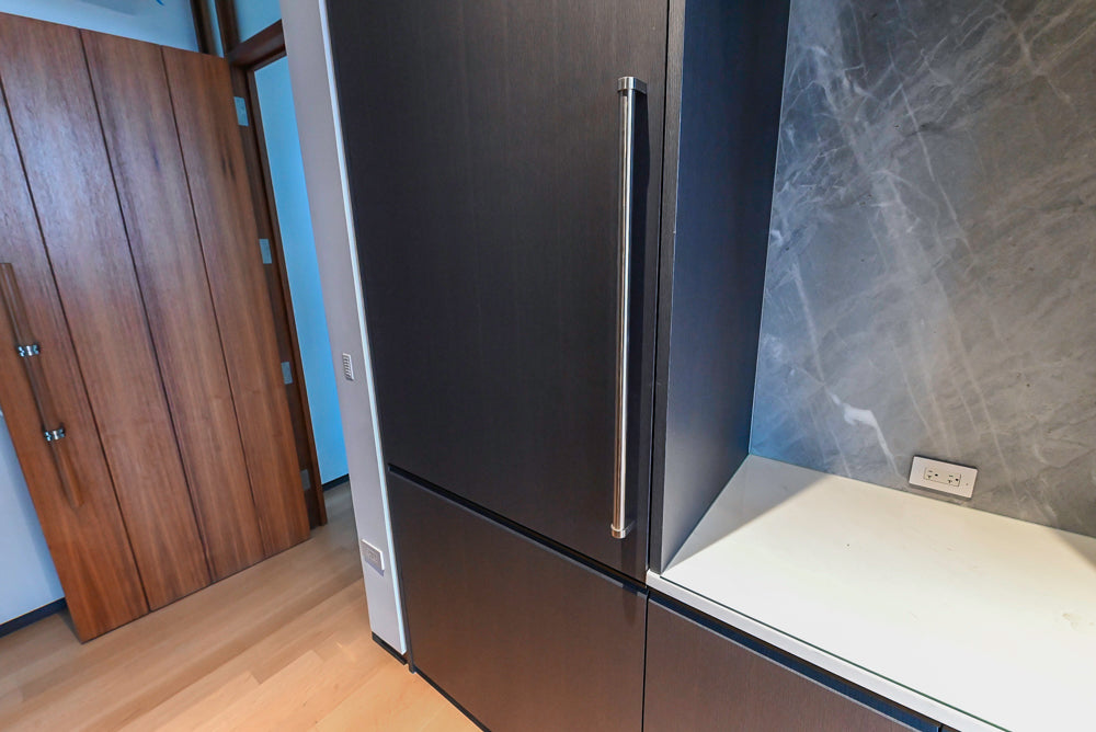 Custom Modern Wood Veneer Kitchen with White Marble Countertops and Wolf & Miele Appliances