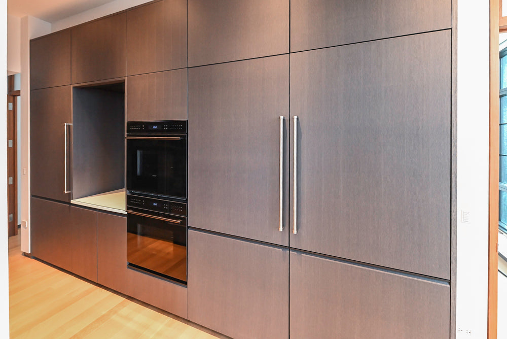 Custom Modern Wood Veneer Kitchen with White Marble Countertops and Wolf & Miele Appliances